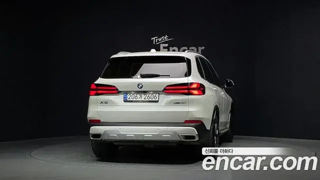 BMW X5 2024 — ფოტო 23/34