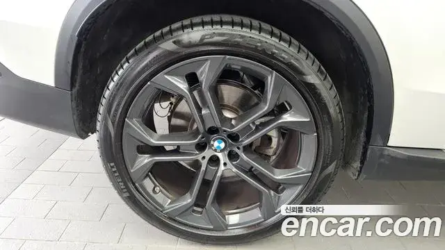 BMW X5 2024 — ფოტო 30/34