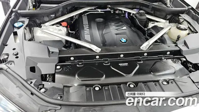 BMW X5 2024 — ფოტო 16/34
