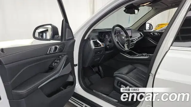 BMW X5 2024 — ფოტო 22/34