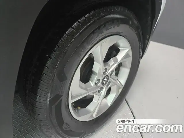 Hyundai Tucson Hybrid 2022 — ფოტო 8/20
