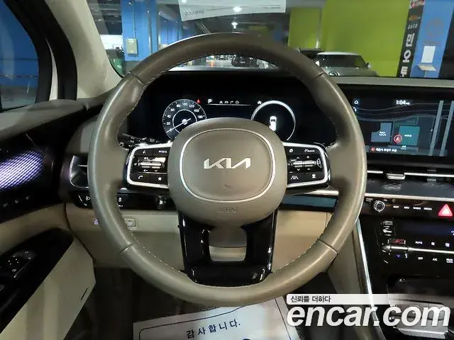 Kia Carnival 2023 — ფოტო 1/20
