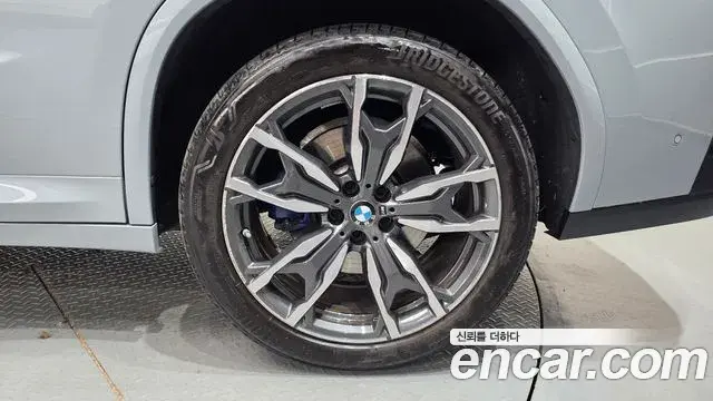 BMW X4 2024 — ფოტო 21/35