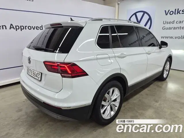 Volkswagen Tiguan 2020 — Фото 1/19