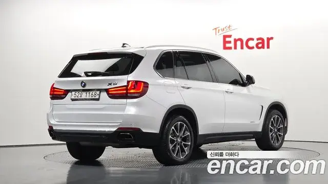 BMW X5 2018 — Фото 1/20