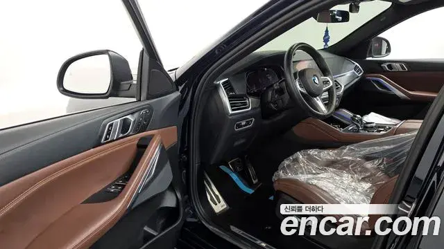 BMW X6 2022 — ფოტო 11/36