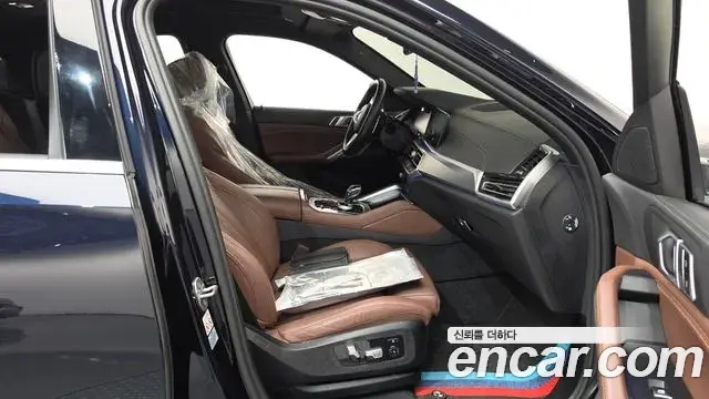 BMW X6 2022 — ფოტო 14/36