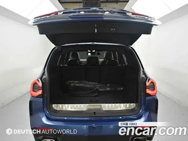 BMW X3 2021 — ფოტო 14/20