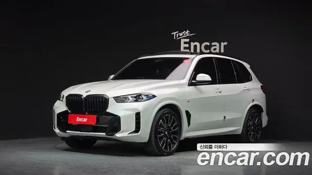BMW X5 2023 — Фото 1/20