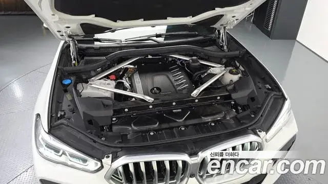 BMW X6 2022 — ფოტო 23/33