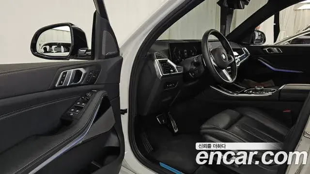 BMW X5 2025 — ფოტო 32/35