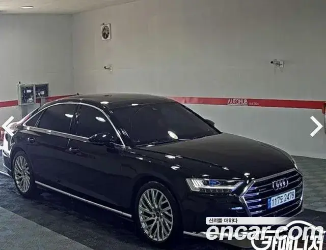 Audi A8 2021 — Фото 1/18