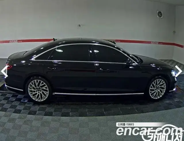 Audi A8 2021 — Фото 2/18