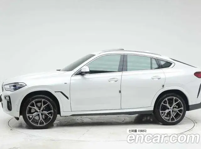 BMW X6 2021 — ფოტო 15/20