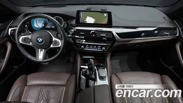 BMW 5 Series 2018 — Фото 7/20