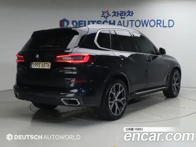 BMW X5 2022 — Фото 1/20