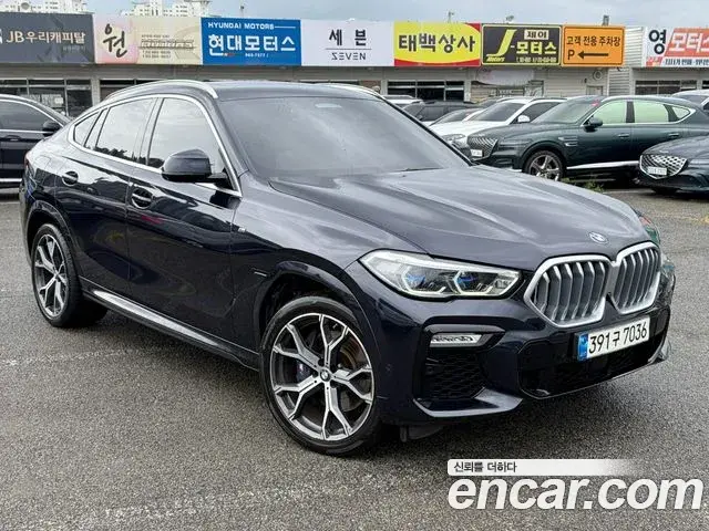 BMW X6 2021 — Фото 4/20