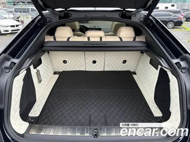 BMW X6 2021 — Фото 12/20