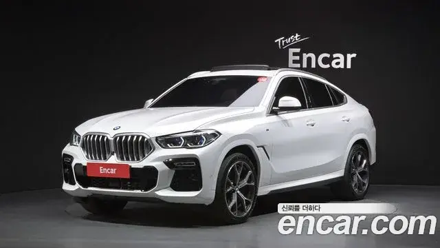 BMW X6 2021 — Фото 1/20