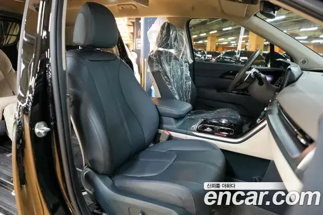 Kia Carnival 2021 — ფოტო 3/20