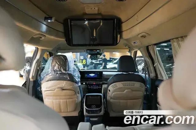 Kia Carnival 2021 — ფოტო 19/20