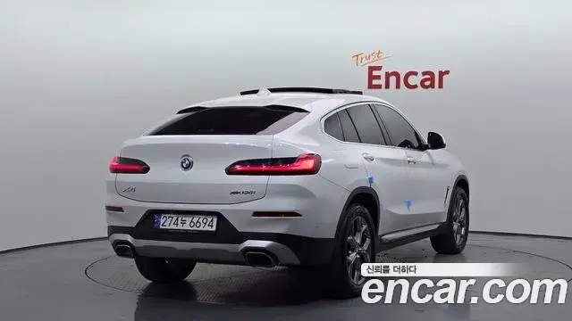 BMW X4 2023 — ფოტო 5/20