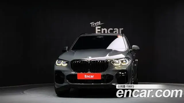 BMW X5 2023 — ფოტო 4/20
