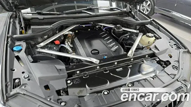 BMW X5 2023 — ფოტო 6/20