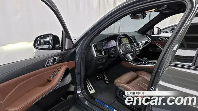BMW X5 2023 — ფოტო 7/20