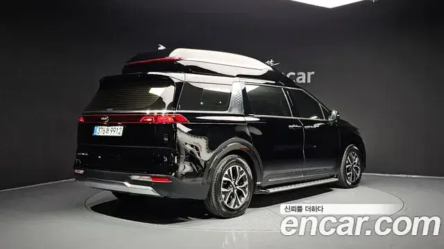 Kia Carnival 2021 — ფოტო 1/20