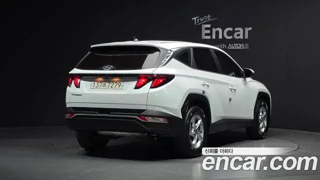 Hyundai Tucson Hybrid 2021 — ფოტო 9/20