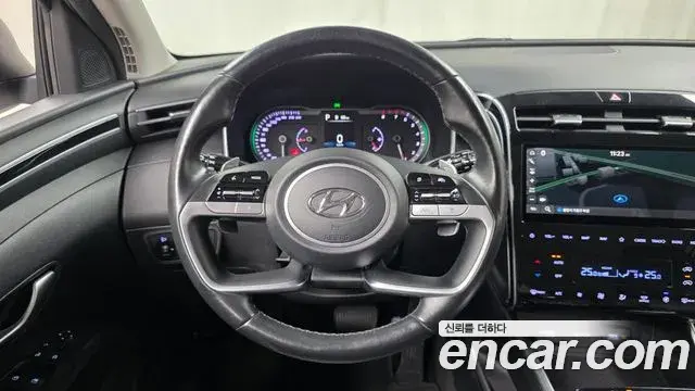 Hyundai Tucson Hybrid 2021 — ფოტო 8/20