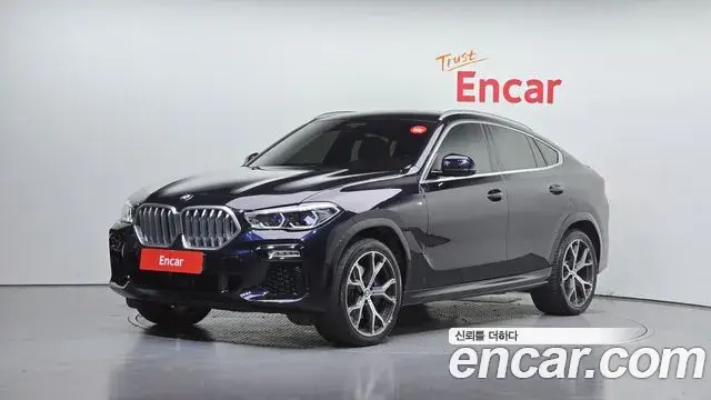 BMW X6 2020 — Фото 1/20