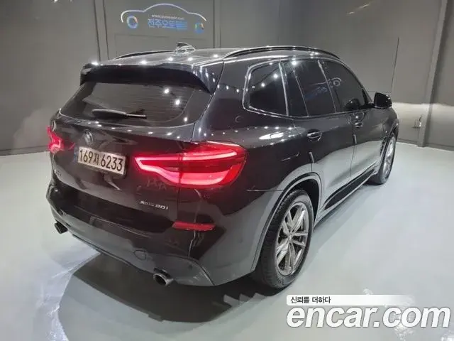 BMW X3 2021 — ფოტო 18/20