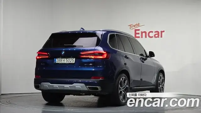 BMW X5 2021 — ფოტო 14/20