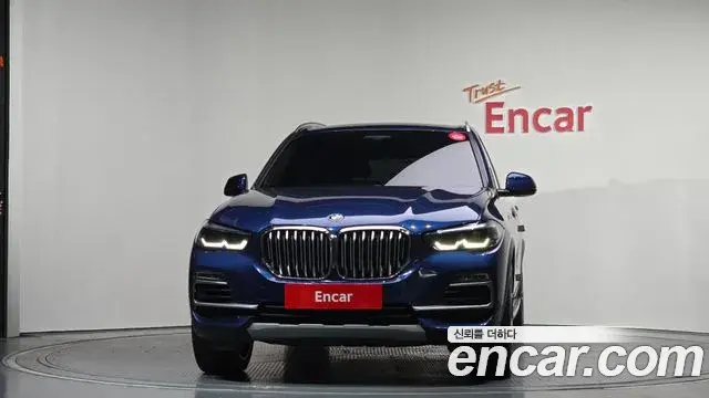 BMW X5 2021 — ფოტო 7/20