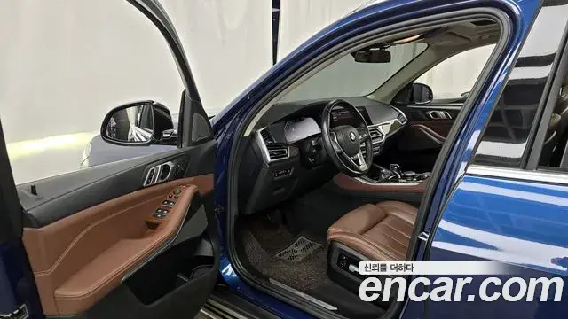 BMW X5 2021 — ფოტო 18/20