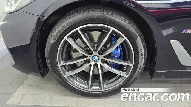 BMW 5 Series 2023 — ფოტო 16/20