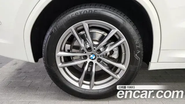 BMW X3 2021 — ფოტო 15/20