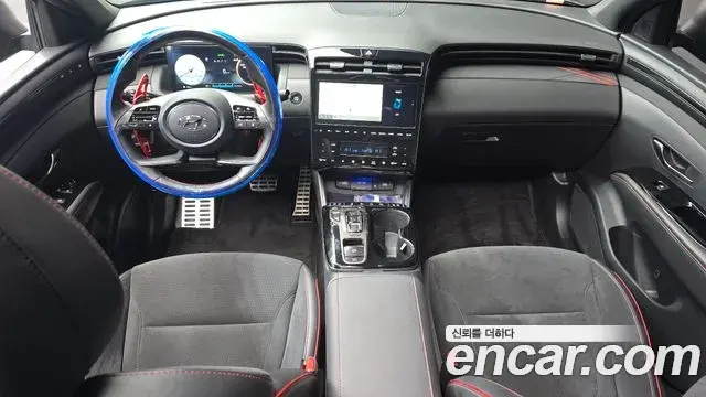 Hyundai Tucson Hybrid 2023 — ფოტო 8/20