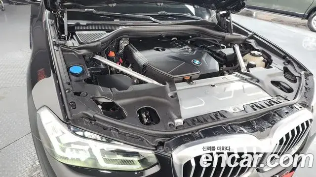 BMW X3 2021 — ფოტო 13/20