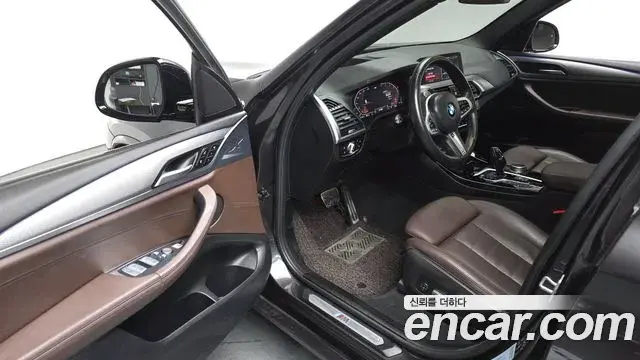 BMW X3 2021 — ფოტო 18/20