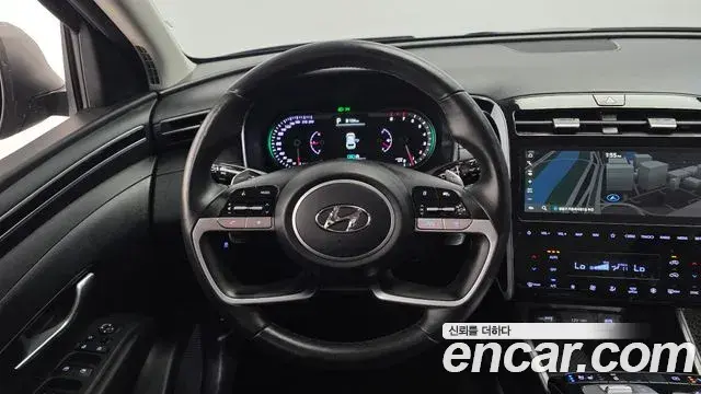 Hyundai Tucson Hybrid 2022 — ფოტო 8/29