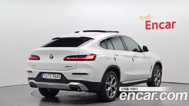 BMW X4 2021 — Фото 2/20