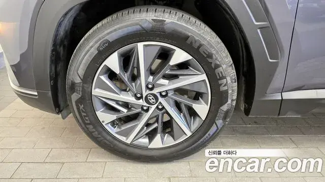 Hyundai Tucson Hybrid 2021 — ფოტო 11/20
