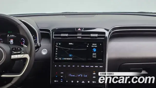 Hyundai Tucson Hybrid 2022 — ფოტო 9/20