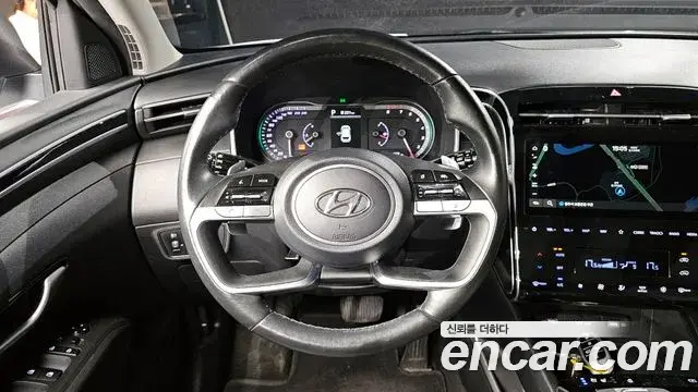 Hyundai Tucson Hybrid 2022 — ფოტო 1/20