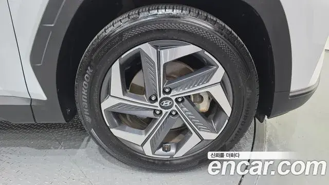 Hyundai Tucson Hybrid 2021 — ფოტო 3/30
