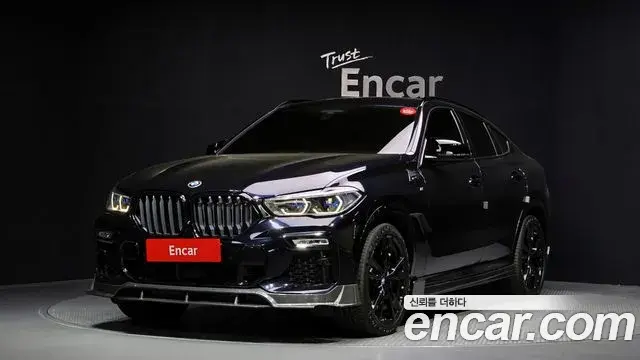 BMW X6 2020 — Фото 1/20
