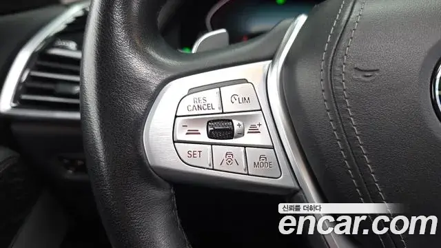 BMW X7 2022 — ფოტო 16/34